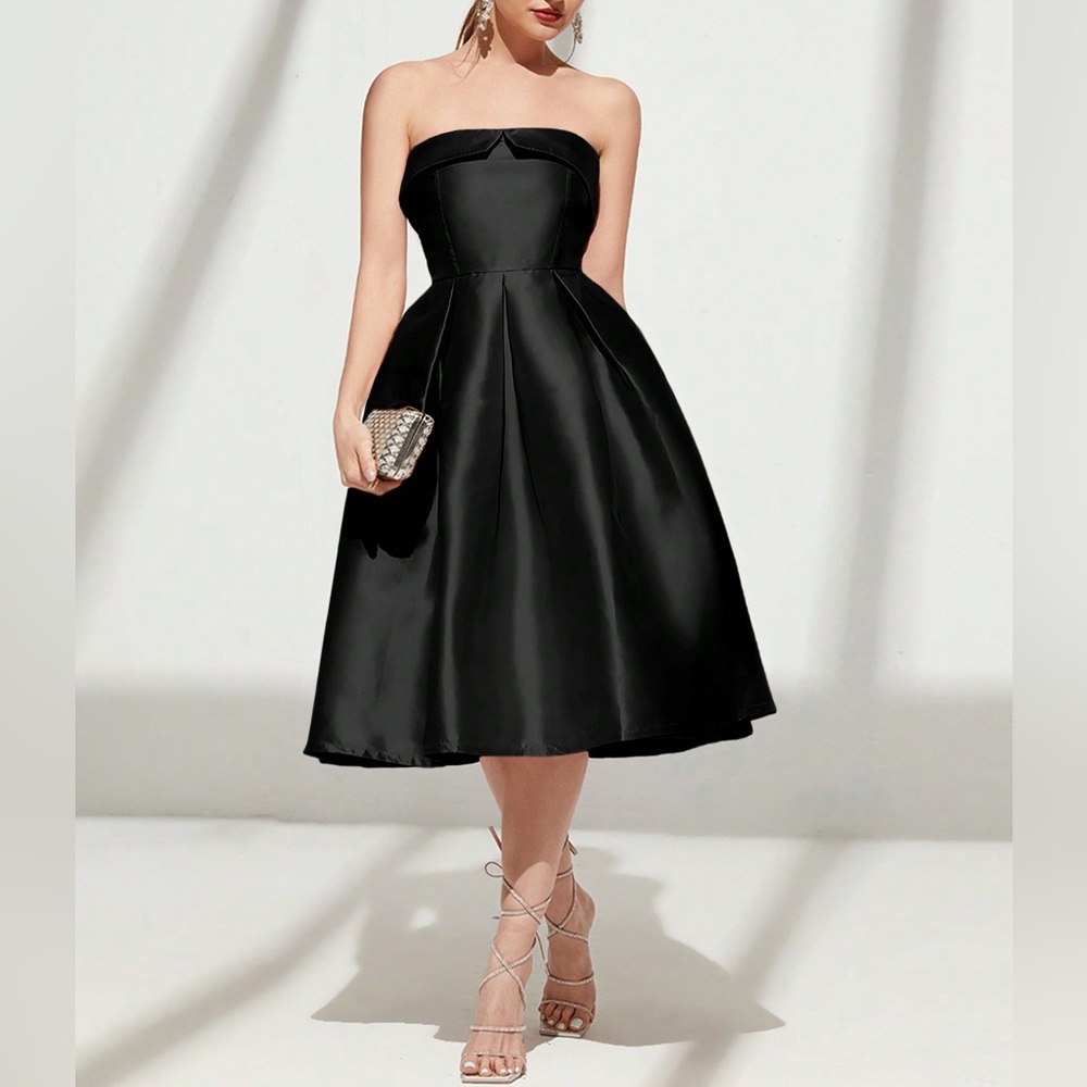 Black decollate dress